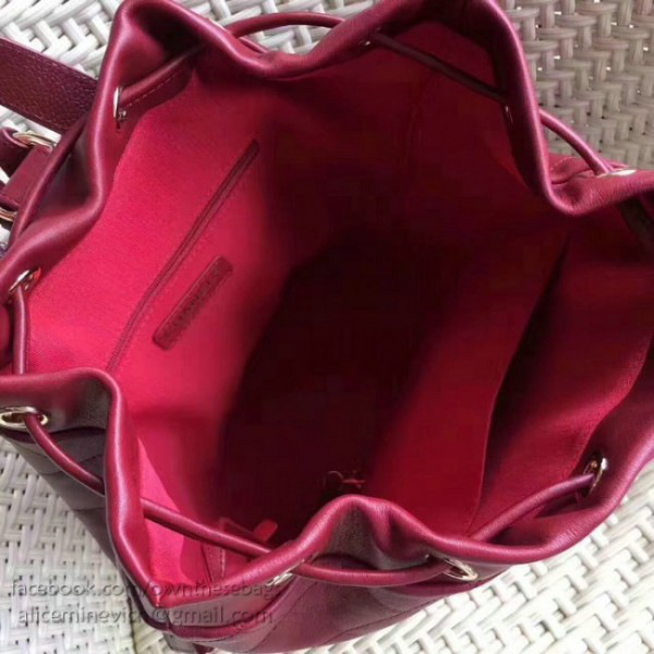 Ch**el calfskin and caviar backpack burgundy