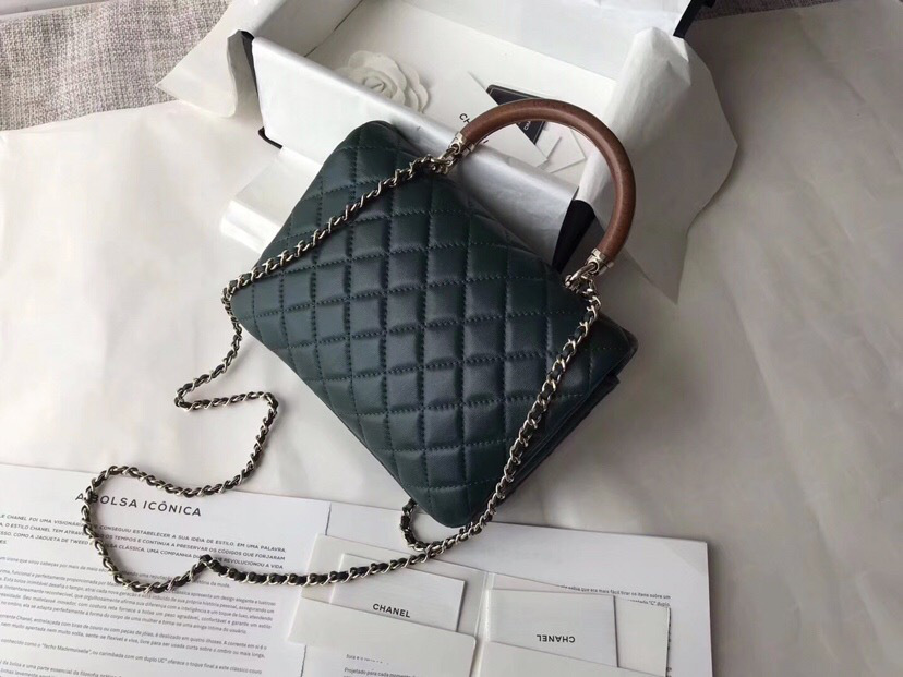 Ch**el flap bag with top handle dark green 21cm