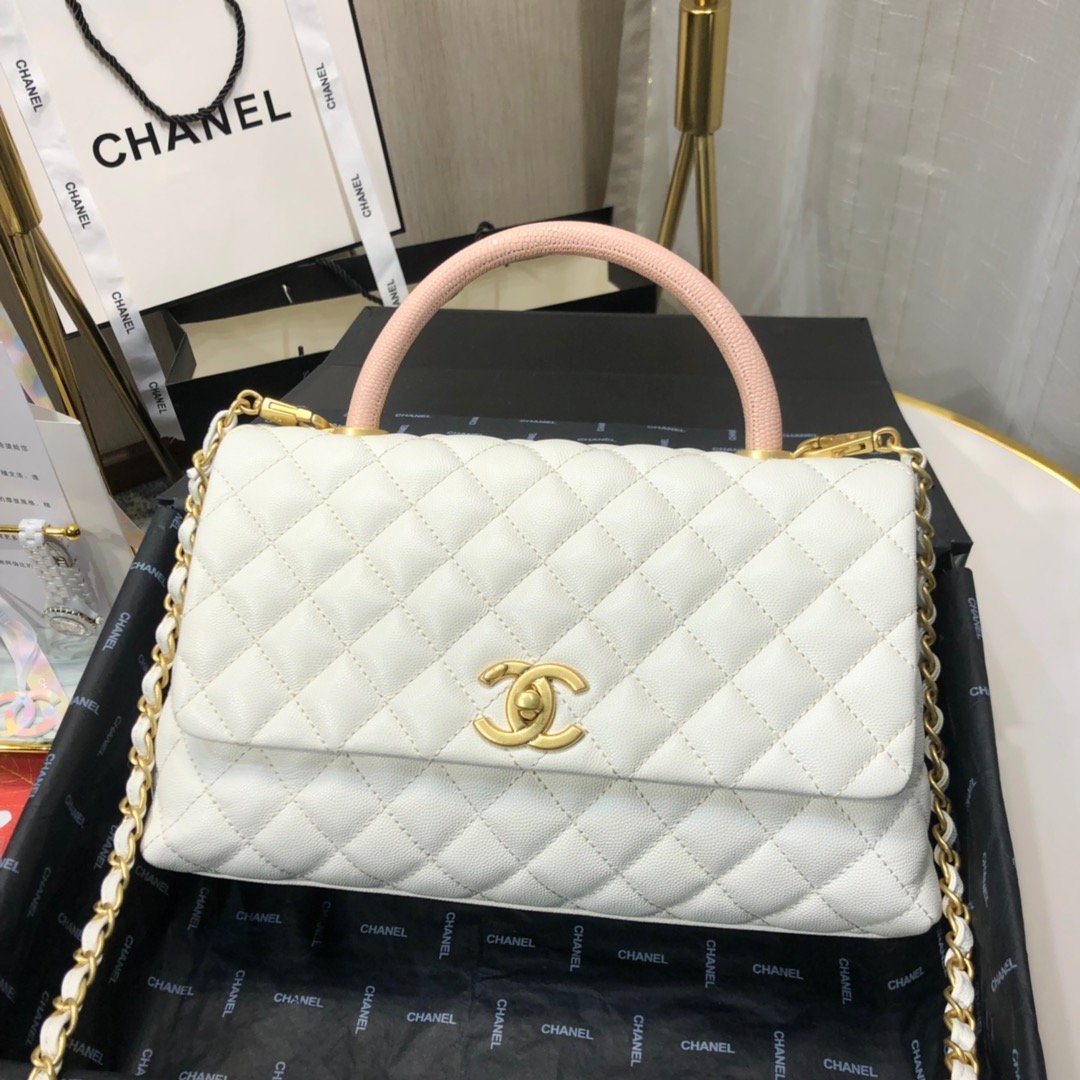 Ch**el maxi flap bag with top handle white 28 cm
