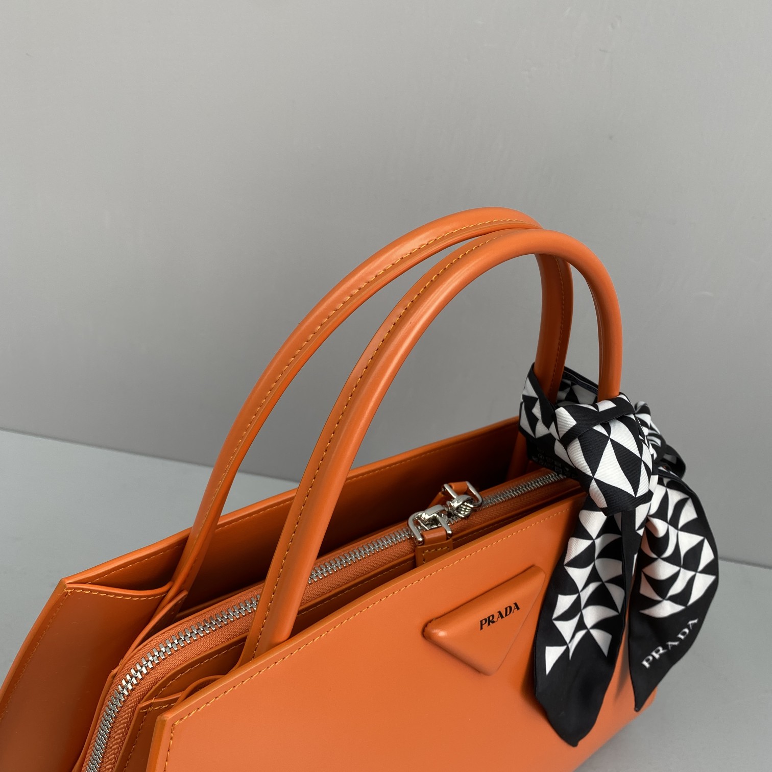 pra*a M1vccia x raf simons orange 33 x 18 x 13.5 cm