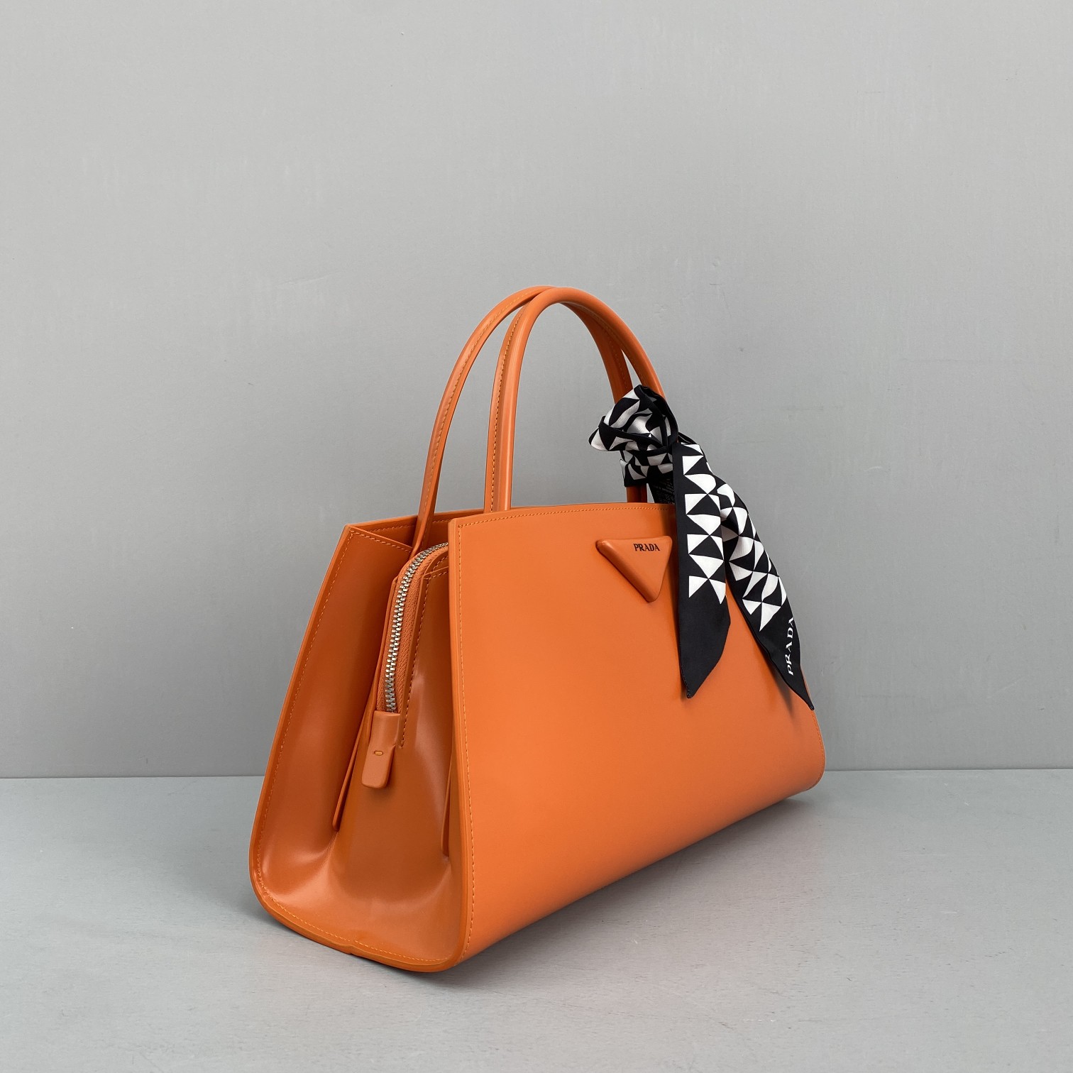 pra*a M1vccia x raf simons orange 33 x 18 x 13.5 cm
