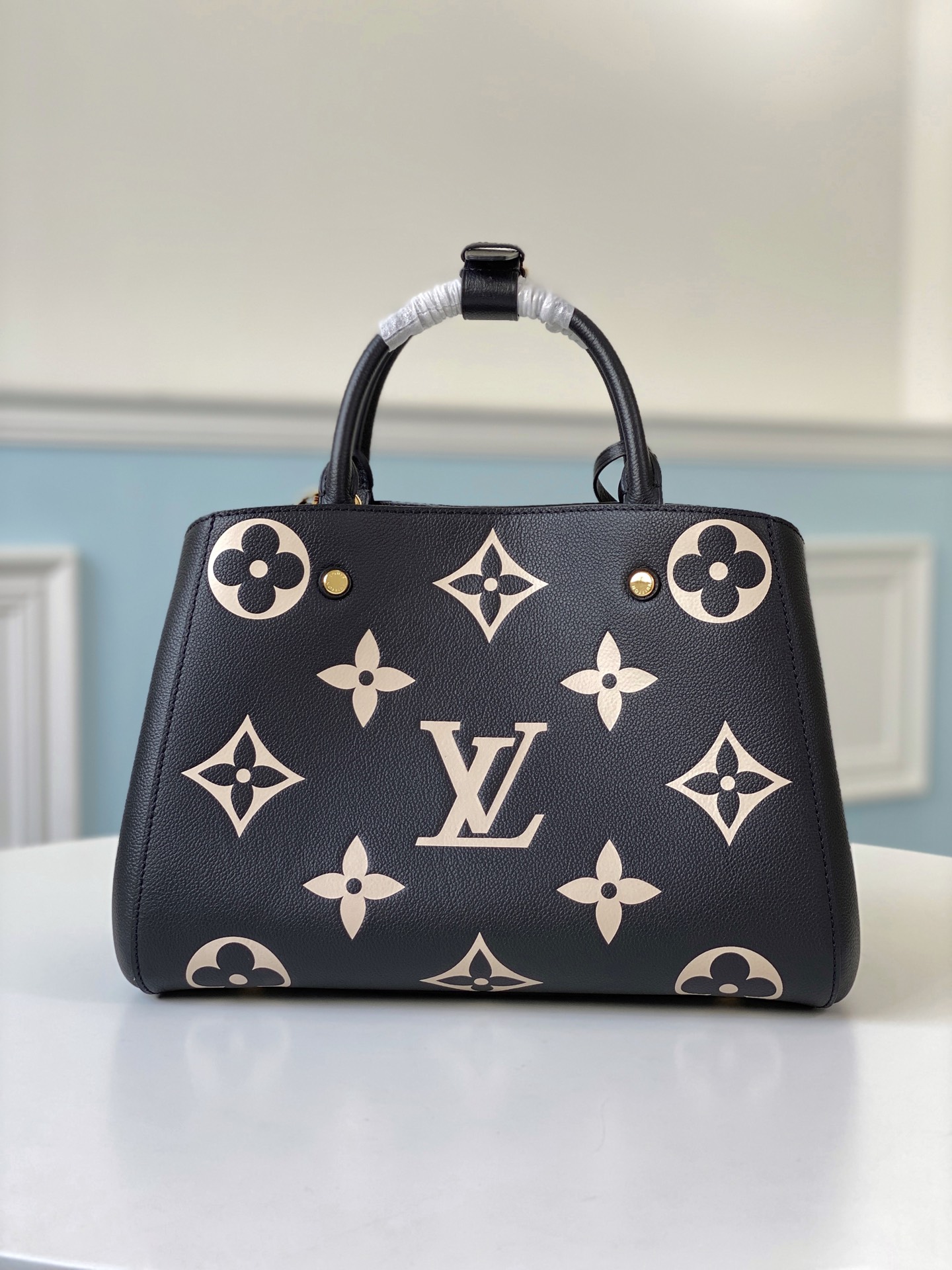 l0vis Vvtt0n montaigne mm bicolor monogram empreinte leather m45499 33 x 23 x 15 cm
