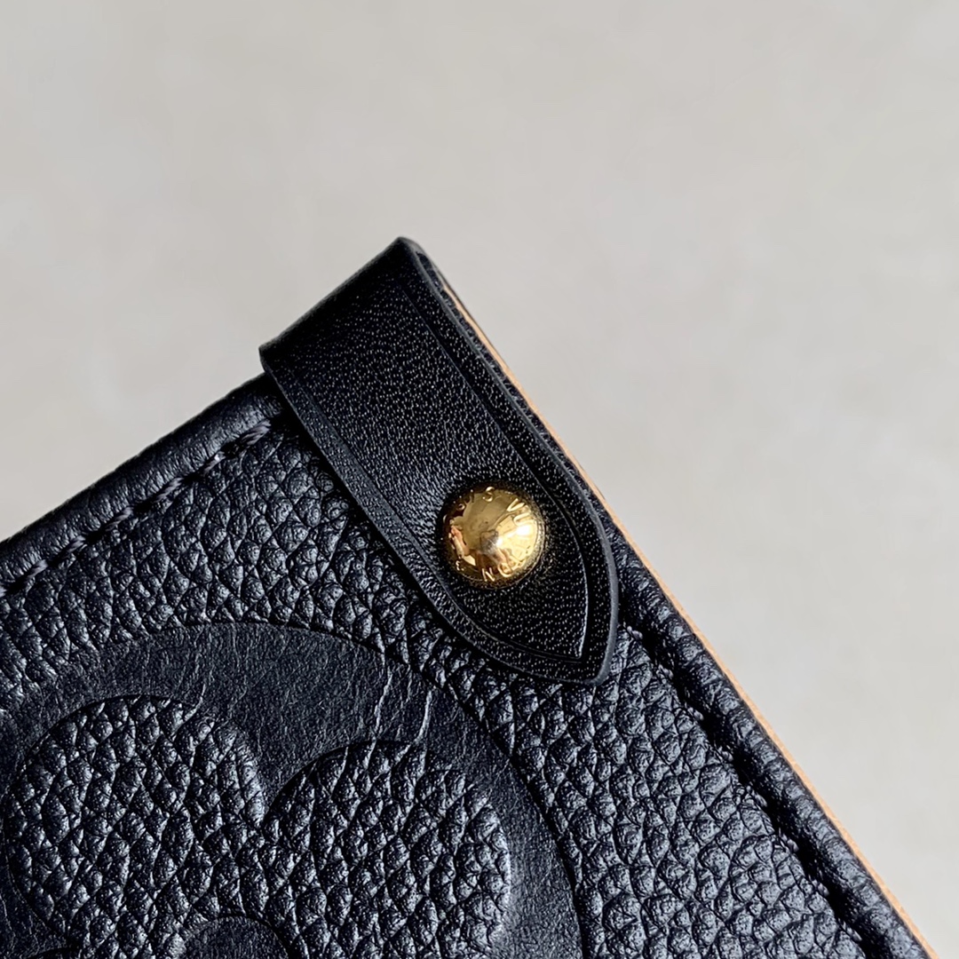 l0vis Vvtt0n onthego mm monogram empreinte embossed leather noir m58522 35 cm