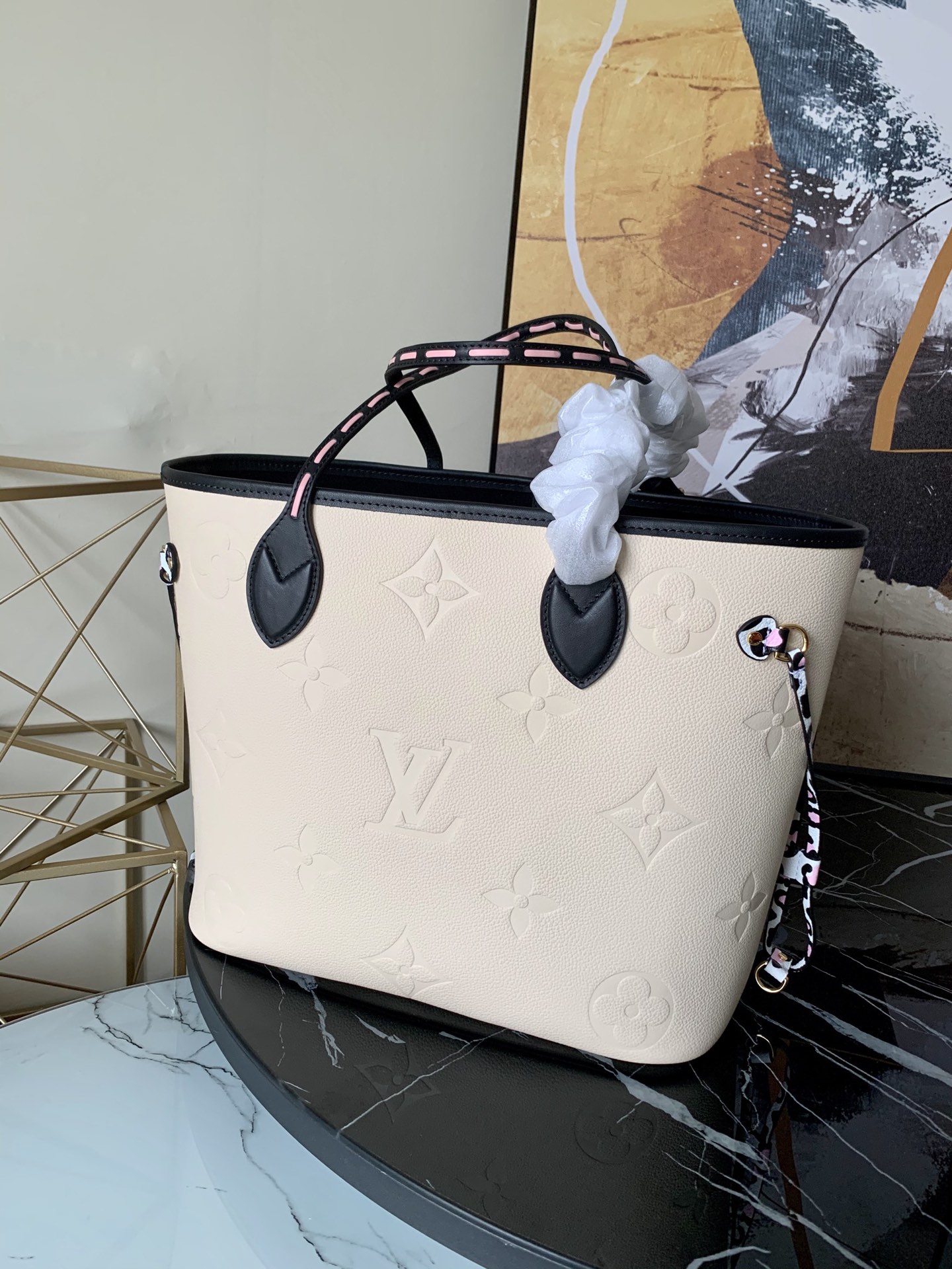 l0vis Vvtt0n neverfull mm monogram empreinte leather creme m58525 32 cm